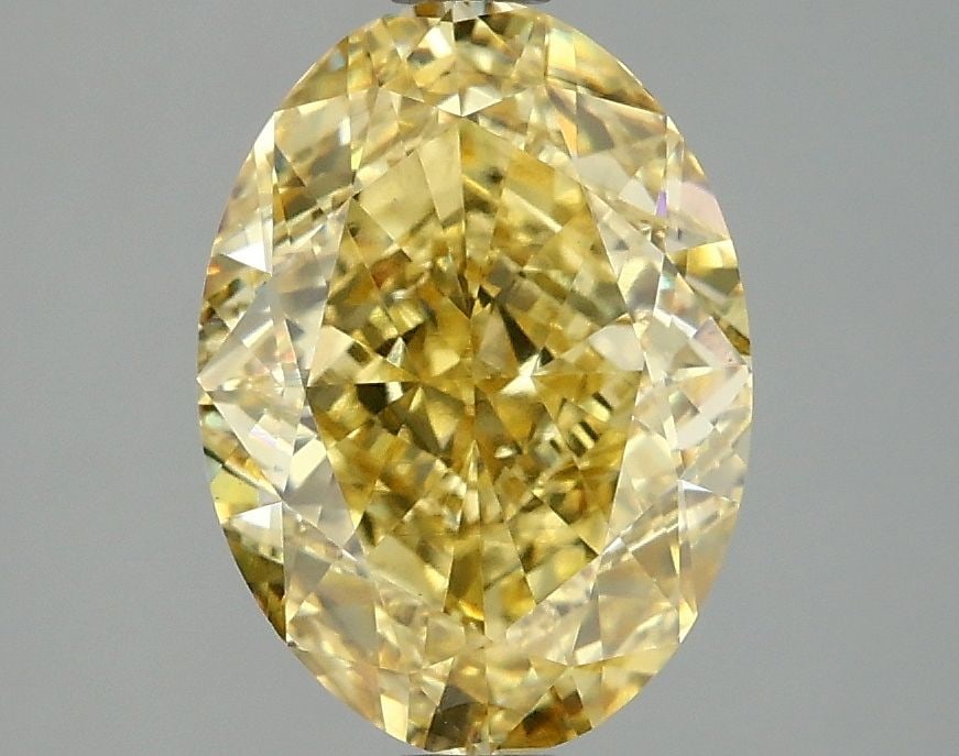 Loose Diamond - OVAL 3.1ct Fancy Vivid Yellow VS2: Loose Diamond - OVAL 3.1ct Fancy Vivid Yellow VS2 Source: This is a real non-mined Diamond that has been grown in a lab Shape: OVAL Carats: 3.1 Color: Fancy Vivid Yellow Certification: IGI Video: