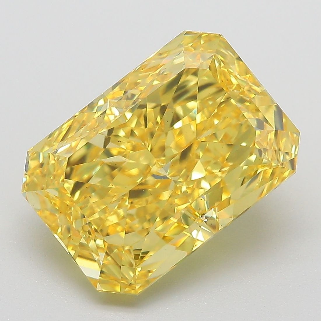 Loose Diamond - RADIANT 6.36ct Fancy Vivid Yellow VS2: Loose Diamond - RADIANT 6.36ct Fancy Vivid Yellow VS2 Source: This is a real non-mined Diamond that has been grown in a lab Shape: RADIANT Carats: 6.36 Color: Fancy Vivid Yellow Certification: IGI Vid