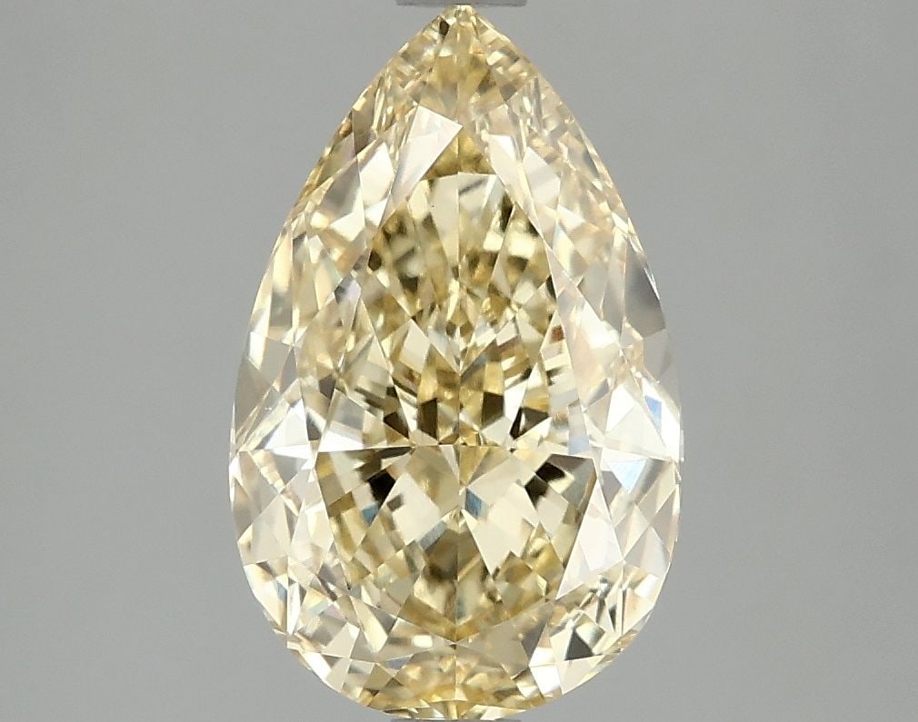 Loose Diamond - PEAR 3.09ct Fancy Vivid Yellow VS1: Loose Diamond - PEAR 3.09ct Fancy Vivid Yellow VS1 Source: This is a real non-mined Diamond that has been grown in a lab Shape: PEAR Carats: 3.09 Color: Fancy Vivid Yellow Certification: IGI Video: