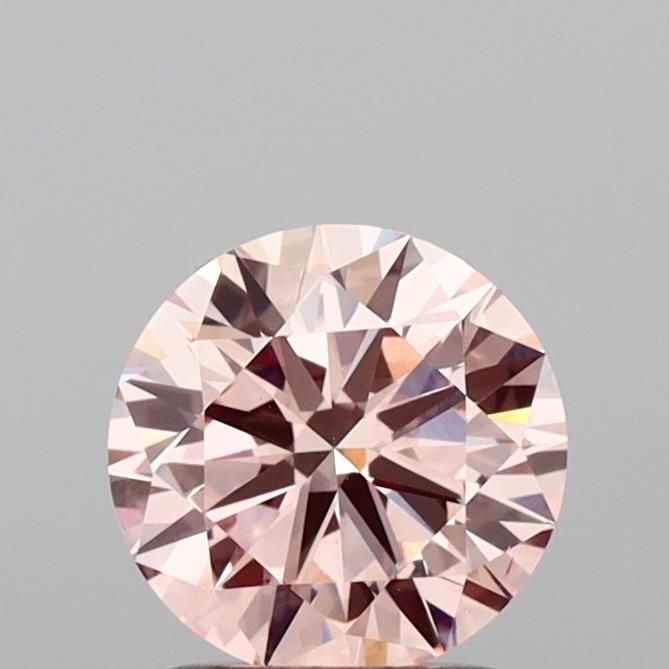 Loose Diamond - ROUND 1.51ct Fancy Vivid Pink VS1: Loose Diamond - ROUND 1.51ct Fancy Vivid Pink VS1 Source: This is a real non-mined Diamond that has been grown in a lab Shape: ROUND Carats: 1.51 Color: Fancy Vivid Pink Certification: IGI Video: