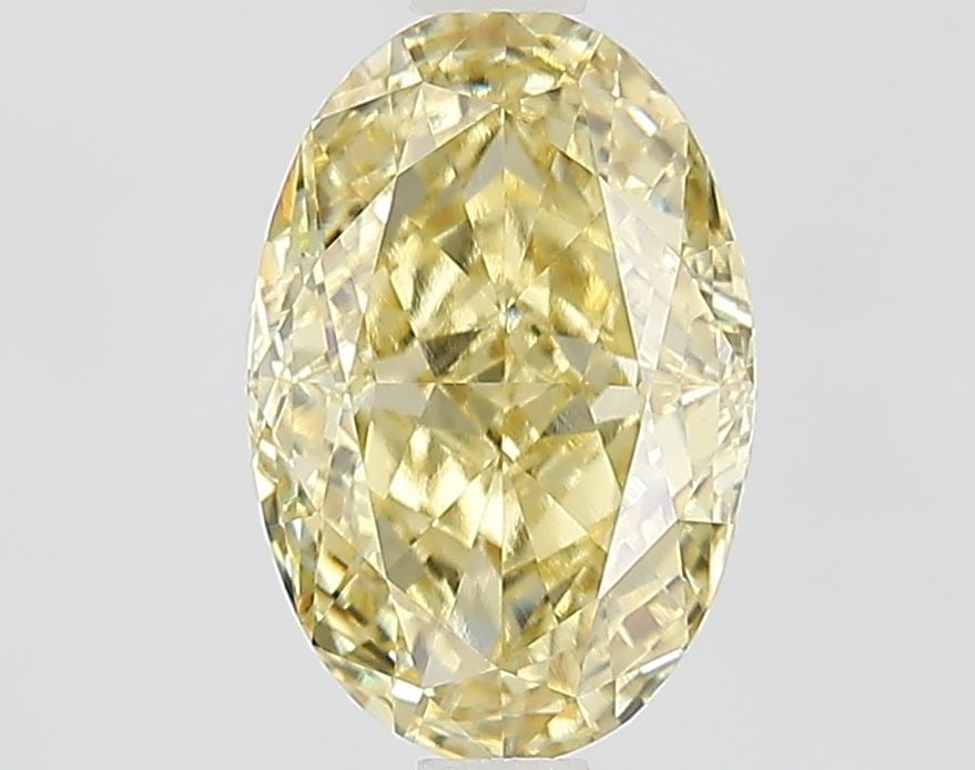 Loose Diamond - OVAL 1.91ct Fancy Yellow VVS2: Loose Diamond - OVAL 1.91ct Fancy Yellow VVS2 Source: This is a real non-mined Diamond that has been grown in a lab Shape: OVAL Carats: 1.91 Color: Fancy Yellow Certification: IGI Video: