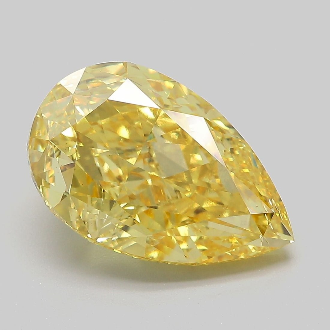Loose Diamond - PEAR 6.05ct Fancy Vivid Yellow VS2: Loose Diamond - PEAR 6.05ct Fancy Vivid Yellow VS2 Source: This is a real non-mined Diamond that has been grown in a lab Shape: PEAR Carats: 6.05 Color: Fancy Vivid Yellow Certification: IGI Video: