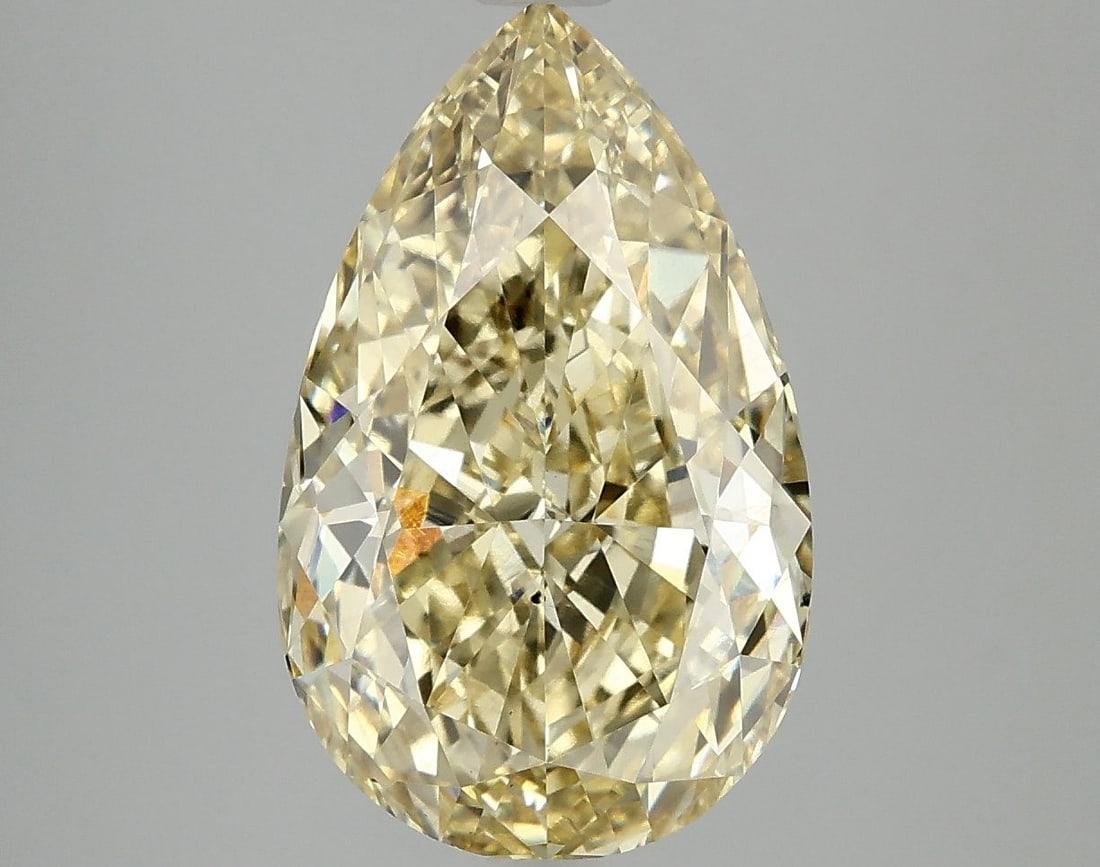 Loose Diamond - PEAR 5.1ct Fancy Vivid Yellow VS2: Loose Diamond - PEAR 5.1ct Fancy Vivid Yellow VS2 Source: This is a real non-mined Diamond that has been grown in a lab Shape: PEAR Carats: 5.1 Color: Fancy Vivid Yellow Certification: IGI Video: