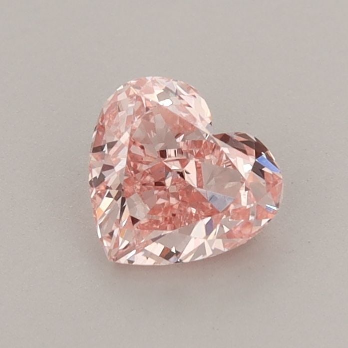 Loose Diamond - HEART 0.68ct Fancy Vivid Pink VS1: Loose Diamond - HEART 0.68ct Fancy Vivid Pink VS1 Source: This is a real non-mined Diamond that has been grown in a lab Shape: HEART Carats: 0.68 Color: Fancy Vivid Pink Certification: IGI Video: