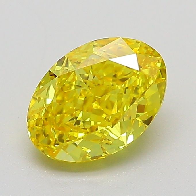 Loose Diamond - OVAL 1.13ct Fancy Vivid Yellow VS1: Loose Diamond - OVAL 1.13ct Fancy Vivid Yellow VS1 Source: This is a real non-mined Diamond that has been grown in a lab Shape: OVAL Carats: 1.13 Color: Fancy Vivid Yellow Certification: IGI Video: