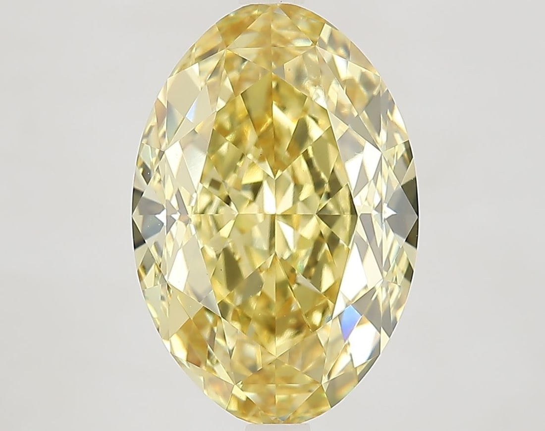 Loose Diamond - OVAL 7.09ct Fancy Intense Yellow VVS2: Loose Diamond - OVAL 7.09ct Fancy Intense Yellow VVS2 Source: This is a real non-mined Diamond that has been grown in a lab Shape: OVAL Carats: 7.09 Color: Fancy Intense Yellow Certification: IGI Vide