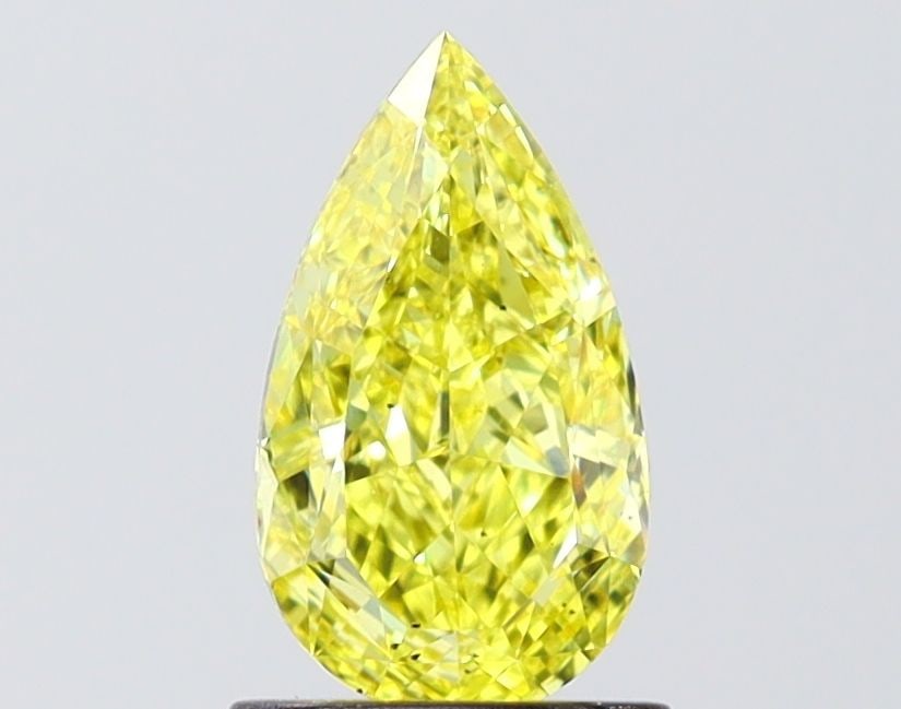 Loose Diamond - PEAR 1.18ct Fancy Vivid Yellow VS2: Loose Diamond - PEAR 1.18ct Fancy Vivid Yellow VS2 Source: This is a real non-mined Diamond that has been grown in a lab Shape: PEAR Carats: 1.18 Color: Fancy Vivid Yellow Certification: IGI Video: