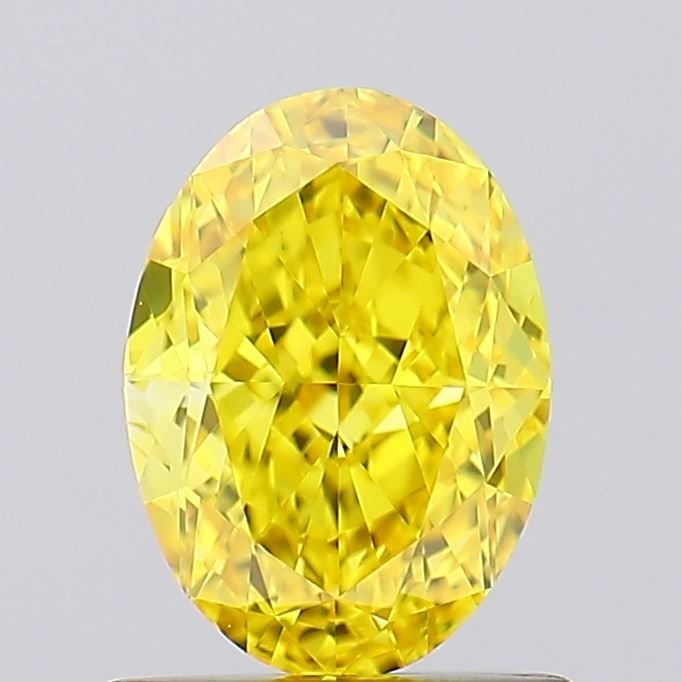 Loose Diamond - OVAL 1.09ct Fancy Vivid Yellow VVS2: Loose Diamond - OVAL 1.09ct Fancy Vivid Yellow VVS2 Source: This is a real non-mined Diamond that has been grown in a lab Shape: OVAL Carats: 1.09 Color: Fancy Vivid Yellow Certification: IGI Video: