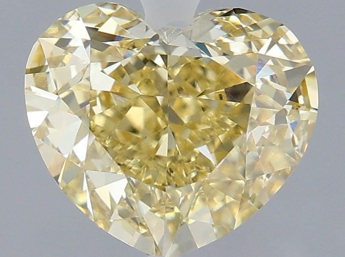 Loose Diamond - HEART 3.04ct Fancy Intense Yellow VVS2: Loose Diamond - HEART 3.04ct Fancy Intense Yellow VVS2 Source: This is a real non-mined Diamond that has been grown in a lab Shape: HEART Carats: 3.04 Color: Fancy Intense Yellow Certification: IGI Vi