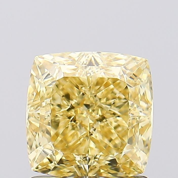 Loose Diamond - CUSHION MODIFIED 1.34ct Fancy Vivid Yellow VS2: Loose Diamond - CUSHION MODIFIED 1.34ct Fancy Vivid Yellow VS2 Source: This is a real non-mined Diamond that has been grown in a lab Shape: CUSHION MODIFIED Carats: 1.34 Color: Fancy Vivid Yellow Cert
