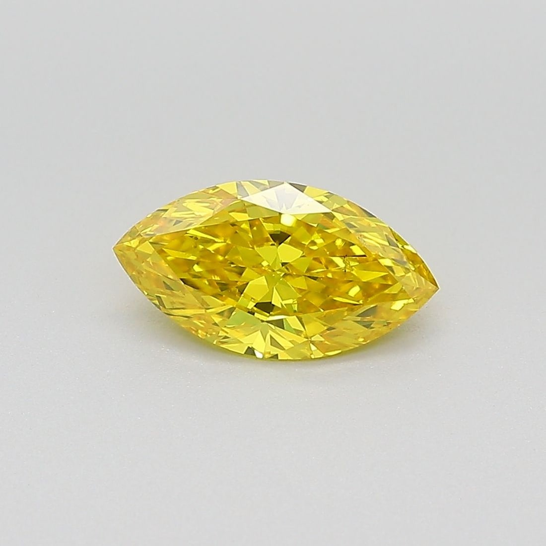 Loose Diamond - MARQUISE 0.84ct Fancy Vivid Yellow SI1: Loose Diamond - MARQUISE 0.84ct Fancy Vivid Yellow SI1 Source: This is a real non-mined Diamond that has been grown in a lab Shape: MARQUISE Carats: 0.84 Color: Fancy Vivid Yellow Certification: IGI V