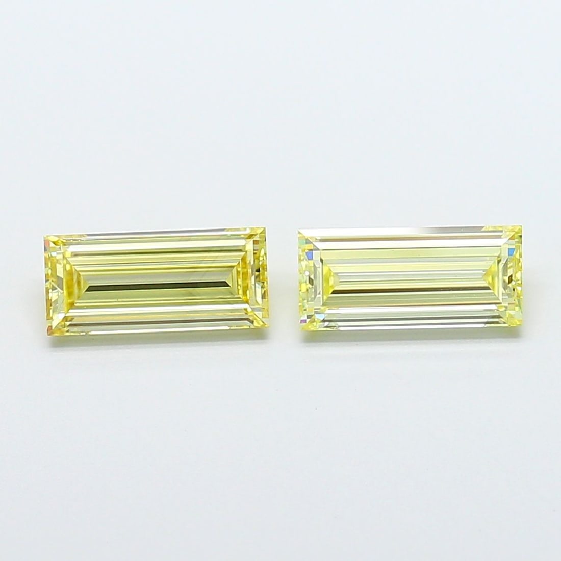 Loose Diamond - BAGUETTE 1.05ct Fancy Light Yellow VS2: Loose Diamond - BAGUETTE 1.05ct Fancy Light Yellow VS2 Source: This is a real non-mined Diamond that has been grown in a lab Shape: BAGUETTE Carats: 1.05 Color: Fancy Light Yellow Certification: IGI V