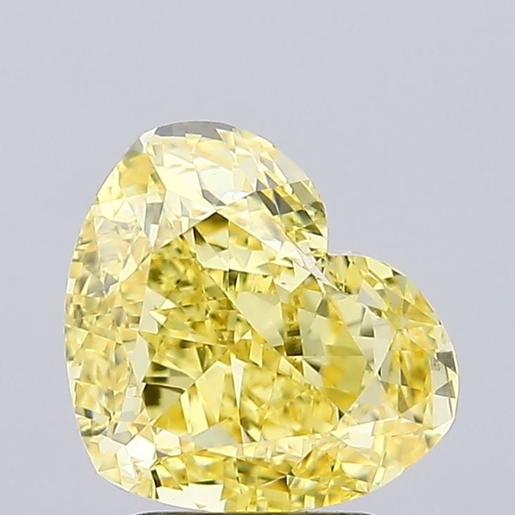 Loose Diamond - HEART 3.02ct Fancy Vivid Yellow VVS2: Loose Diamond - HEART 3.02ct Fancy Vivid Yellow VVS2 Source: This is a real non-mined Diamond that has been grown in a lab Shape: HEART Carats: 3.02 Color: Fancy Vivid Yellow Certification: IGI Video: