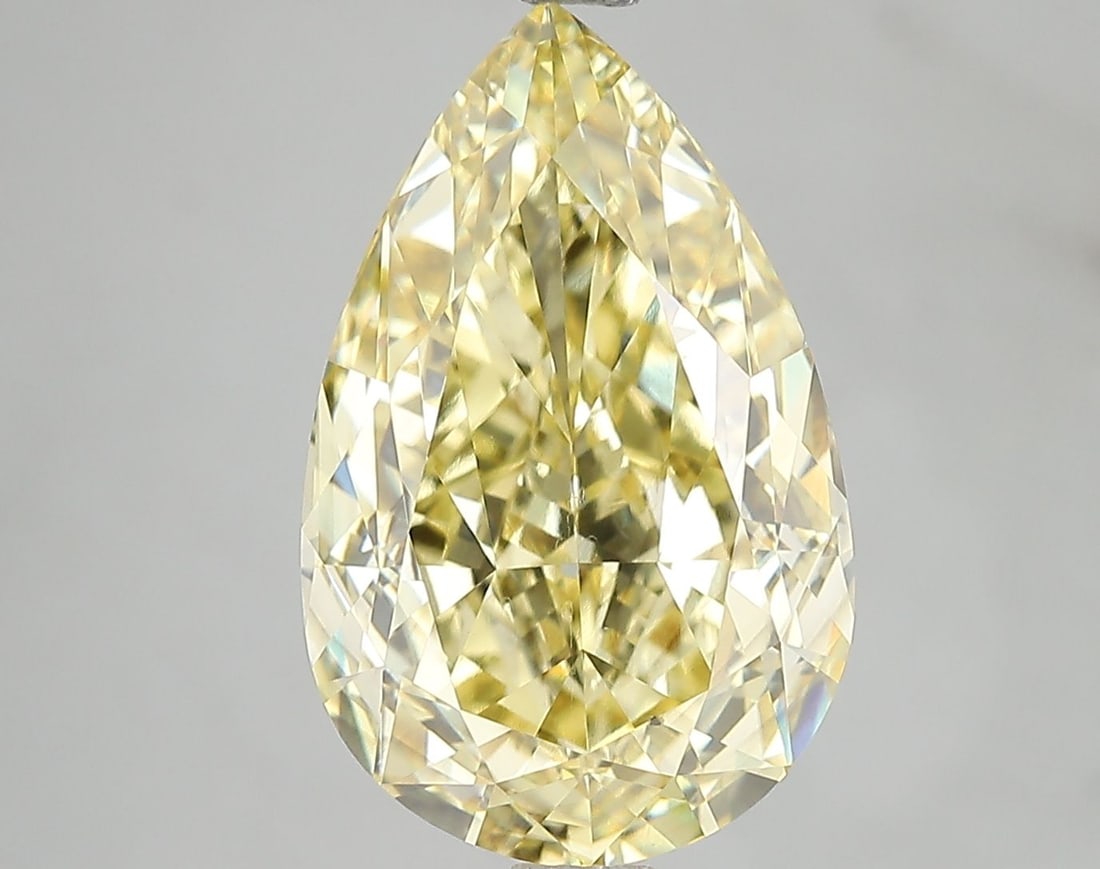 Loose Diamond - PEAR 7.02ct Fancy Vivid Yellow VS2: Loose Diamond - PEAR 7.02ct Fancy Vivid Yellow VS2 Source: This is a real non-mined Diamond that has been grown in a lab Shape: PEAR Carats: 7.02 Color: Fancy Vivid Yellow Certification: IGI Video: