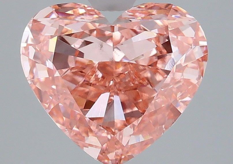 Loose Diamond - HEART 3.0ct Fancy Vivid Pink VS2: Loose Diamond - HEART 3.0ct Fancy Vivid Pink VS2 Source: This is a real non-mined Diamond that has been grown in a lab Shape: HEART Carats: 3.0 Color: Fancy Vivid Pink Certification: IGI Video: