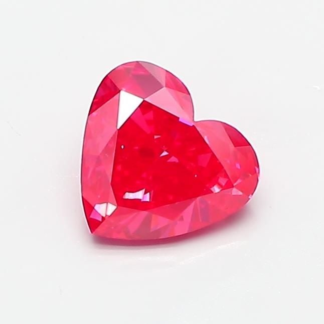 Loose Diamond - HEART 0.88ct Fancy Vivid Pink VS1: Loose Diamond - HEART 0.88ct Fancy Vivid Pink VS1 Source: This is a real non-mined Diamond that has been grown in a lab Shape: HEART Carats: 0.88 Color: Fancy Vivid Pink Certification: IGI Video: