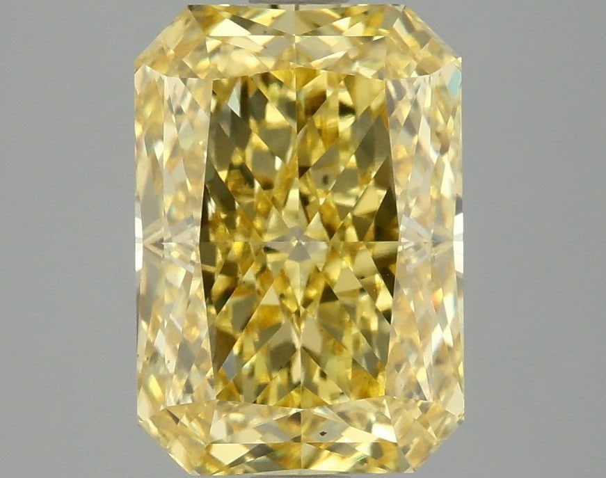 Loose Diamond - RADIANT 3.1ct Fancy Vivid Yellow VS1: Loose Diamond - RADIANT 3.1ct Fancy Vivid Yellow VS1 Source: This is a real non-mined Diamond that has been grown in a lab Shape: RADIANT Carats: 3.1 Color: Fancy Vivid Yellow Certification: IGI Video