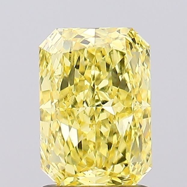 Loose Diamond - RADIANT 1.61ct Fancy Vivid Yellow VS1: Loose Diamond - RADIANT 1.61ct Fancy Vivid Yellow VS1 Source: This is a real non-mined Diamond that has been grown in a lab Shape: RADIANT Carats: 1.61 Color: Fancy Vivid Yellow Certification: IGI Vid