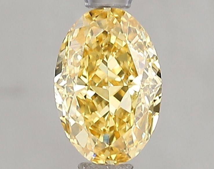 Loose Diamond - OVAL 1.08ct Fancy Vivid Yellow VVS2: Loose Diamond - OVAL 1.08ct Fancy Vivid Yellow VVS2 Source: This is a real non-mined Diamond that has been grown in a lab Shape: OVAL Carats: 1.08 Color: Fancy Vivid Yellow Certification: IGI Video: