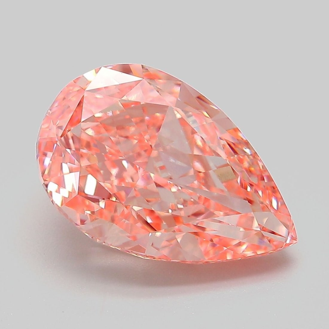 Loose Diamond - PEAR 6.08ct Fancy Vivid Pink VVS2: Loose Diamond - PEAR 6.08ct Fancy Vivid Pink VVS2 Source: This is a real non-mined Diamond that has been grown in a lab Shape: PEAR Carats: 6.08 Color: Fancy Vivid Pink Certification: IGI Video: