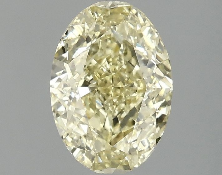 Loose Diamond - OVAL 1.51ct Fancy Vivid Yellow VS2: Loose Diamond - OVAL 1.51ct Fancy Vivid Yellow VS2 Source: This is a real non-mined Diamond that has been grown in a lab Shape: OVAL Carats: 1.51 Color: Fancy Vivid Yellow Certification: IGI Video: