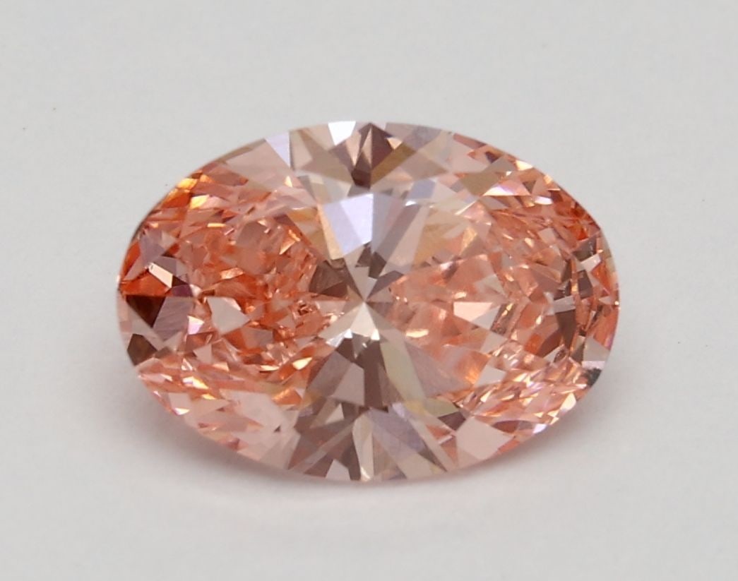 Loose Diamond - OVAL 1.3ct Fancy Vivid Pink VS2: Loose Diamond - OVAL 1.3ct Fancy Vivid Pink VS2 Source: This is a real non-mined Diamond that has been grown in a lab Shape: OVAL Carats: 1.3 Color: Fancy Vivid Pink Certification: IGI Video: