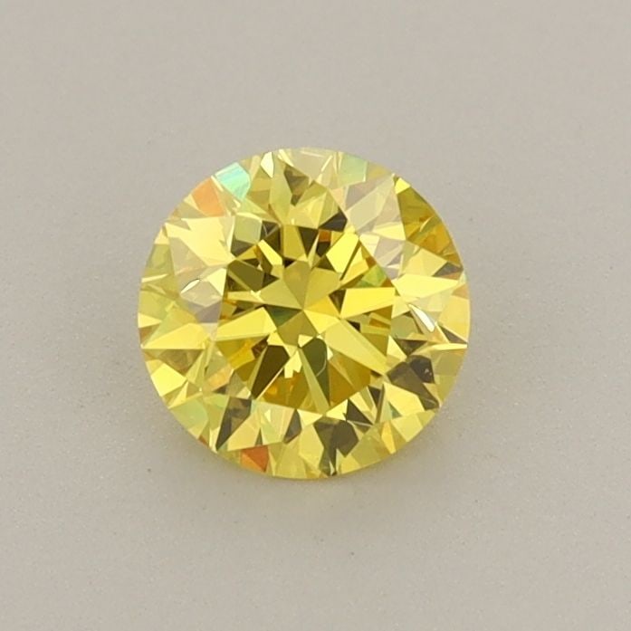Ideal Loose Diamond - ROUND 0.58ct Fancy Vivid Yellow VS1: Ideal Loose Diamond - ROUND 0.58ct Fancy Vivid Yellow VS1 Source: This is a real non-mined Diamond that has been grown in a lab Shape: ROUND Carats: 0.58 Color: Fancy Vivid Yellow Certification: IGI V