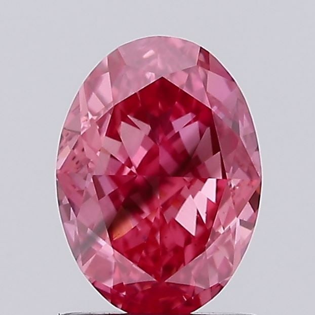 Loose Diamond - OVAL 1.46ct Fancy Vivid Pink SI1: Loose Diamond - OVAL 1.46ct Fancy Vivid Pink SI1 Source: This is a real non-mined Diamond that has been grown in a lab Shape: OVAL Carats: 1.46 Color: Fancy Vivid Pink Certification: IGI Video: