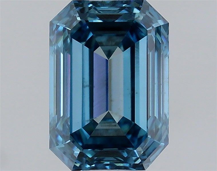 Loose Diamond - EMERALD 0.73ct Fancy Vivid Blue VS2: Loose Diamond - EMERALD 0.73ct Fancy Vivid Blue VS2 Source: This is a real non-mined Diamond that has been grown in a lab Shape: EMERALD Carats: 0.73 Color: Fancy Vivid Blue Certification: IGI Video: