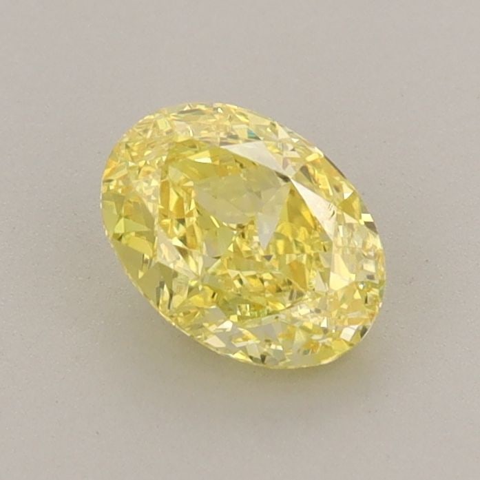Loose Diamond - OVAL 0.79ct Fancy Vivid Yellow VS1: Loose Diamond - OVAL 0.79ct Fancy Vivid Yellow VS1 Source: This is a real non-mined Diamond that has been grown in a lab Shape: OVAL Carats: 0.79 Color: Fancy Vivid Yellow Certification: IGI Video: