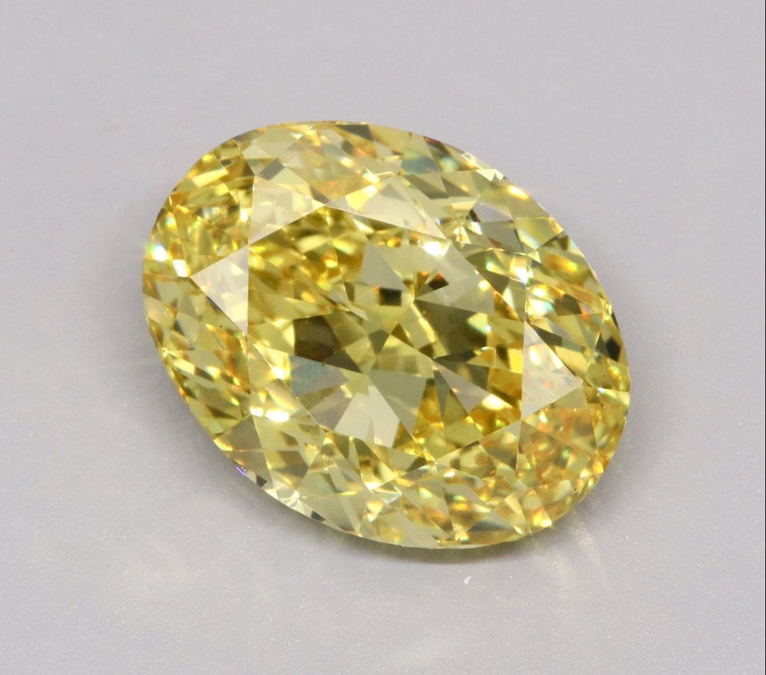 Loose Diamond - OVAL 5.0ct Fancy Vivid Yellow VS1: Loose Diamond - OVAL 5.0ct Fancy Vivid Yellow VS1 Source: This is a real non-mined Diamond that has been grown in a lab Shape: OVAL Carats: 5.0 Color: Fancy Vivid Yellow Certification: IGI The Diamond