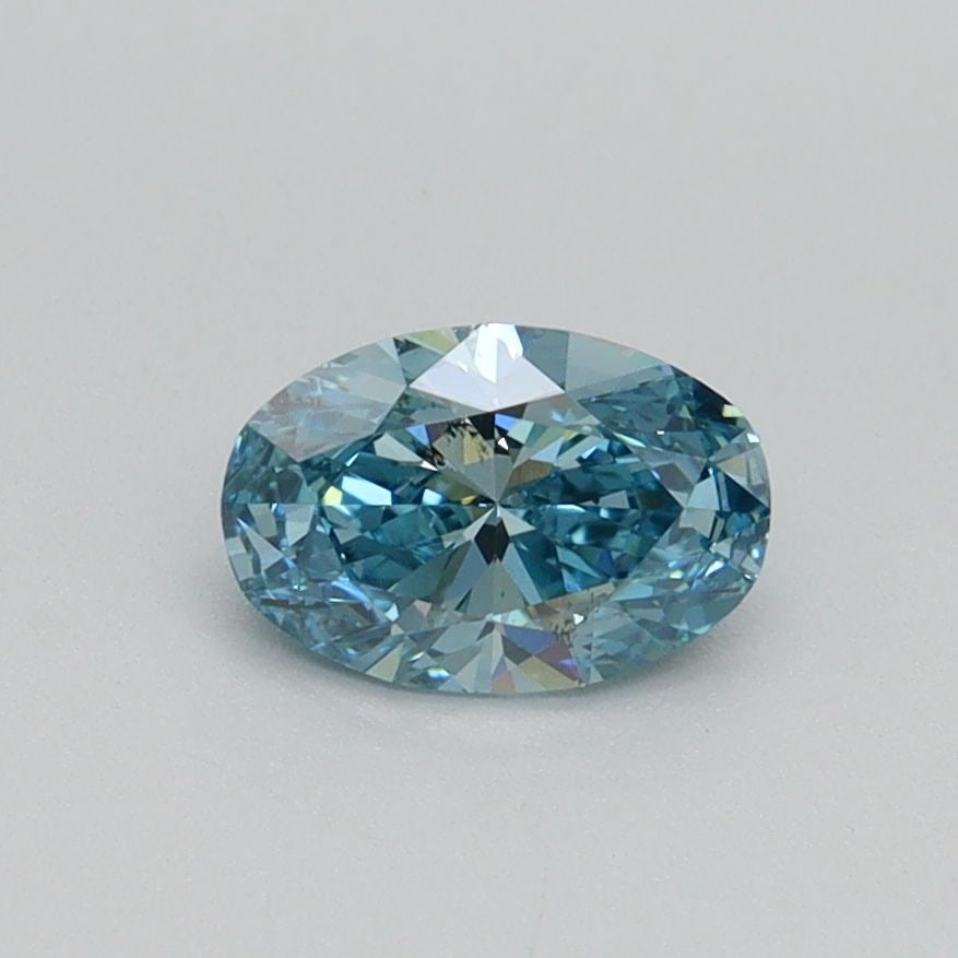 Loose Diamond - OVAL 0.59ct Fancy Vivid Greenish Blue SI1: Loose Diamond - OVAL 0.59ct Fancy Vivid Greenish Blue SI1 Source: This is a real non-mined Diamond that has been grown in a lab Shape: OVAL Carats: 0.59 Color: Fancy Vivid Greenish Blue Certification: