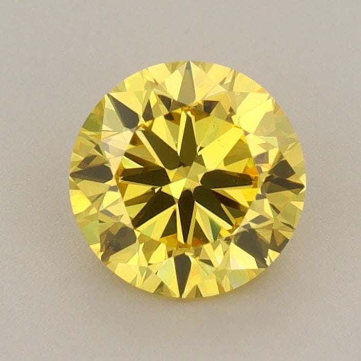 Loose Diamond - ROUND 0.96ct Fancy Vivid Yellow VS1: Loose Diamond - ROUND 0.96ct Fancy Vivid Yellow VS1 Source: This is a real non-mined Diamond that has been grown in a lab Shape: ROUND Carats: 0.96 Color: Fancy Vivid Yellow Certification: IGI Video: