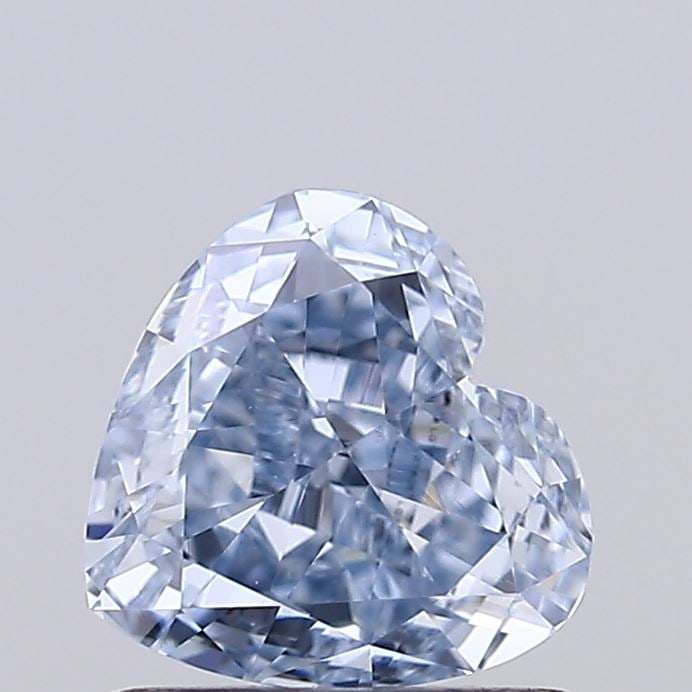 Loose Diamond - HEART 1.01ct Fancy Light Blue VS1: Loose Diamond - HEART 1.01ct Fancy Light Blue VS1 Source: This is a real non-mined Diamond that has been grown in a lab Shape: HEART Carats: 1.01 Color: Fancy Light Blue Certification: IGI Video: