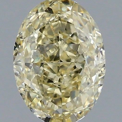 Loose Diamond - OVAL 1.09ct Fancy Light Yellow VVS2: Loose Diamond - OVAL 1.09ct Fancy Light Yellow VVS2 Source: This is a real non-mined Diamond that has been grown in a lab Shape: OVAL Carats: 1.09 Color: Fancy Light Yellow Certification: IGI Video: