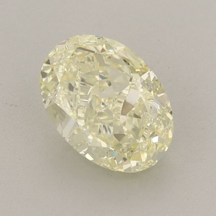 Loose Diamond - OVAL 1.03ct Fancy Light Yellow VVS2: Loose Diamond - OVAL 1.03ct Fancy Light Yellow VVS2 Source: This is a real non-mined Diamond that has been grown in a lab Shape: OVAL Carats: 1.03 Color: Fancy Light Yellow Certification: IGI Video: