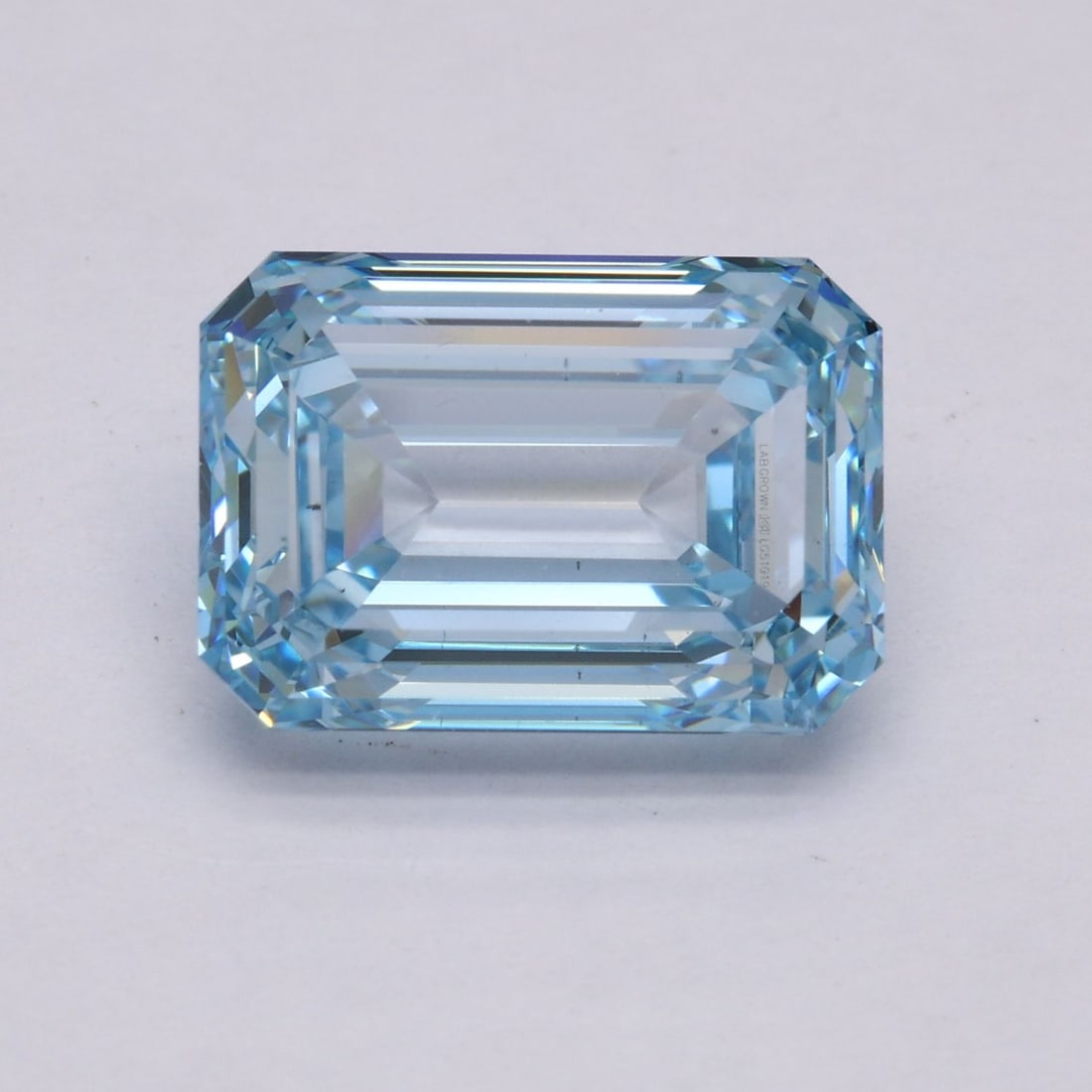 Loose Diamond - EMERALD 5.18ct Fancy Intense Blue VS1: Loose Diamond - EMERALD 5.18ct Fancy Intense Blue VS1 Source: This is a real non-mined Diamond that has been grown in a lab Shape: EMERALD Carats: 5.18 Color: Fancy Intense Blue Certification: IGI Vid