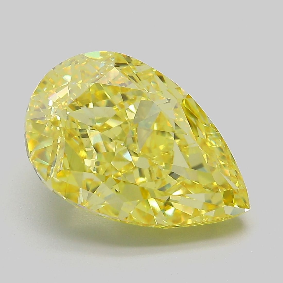 Loose Diamond - PEAR 6.5ct Fancy Vivid Yellow VS1: Loose Diamond - PEAR 6.5ct Fancy Vivid Yellow VS1 Source: This is a real non-mined Diamond that has been grown in a lab Shape: PEAR Carats: 6.5 Color: Fancy Vivid Yellow Certification: IGI Video: