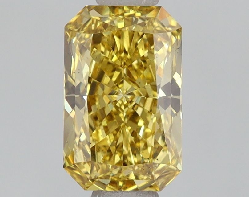 Loose Diamond - RADIANT 1.02ct Fancy Vivid Yellow VS2: Loose Diamond - RADIANT 1.02ct Fancy Vivid Yellow VS2 Source: This is a real non-mined Diamond that has been grown in a lab Shape: RADIANT Carats: 1.02 Color: Fancy Vivid Yellow Certification: IGI Vid