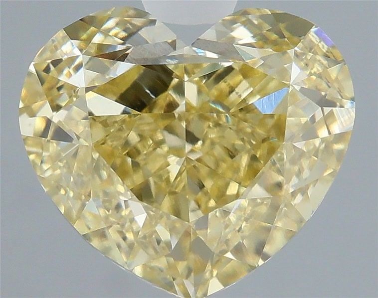 Loose Diamond - HEART 3.01ct Fancy Yellow VVS2: Loose Diamond - HEART 3.01ct Fancy Yellow VVS2 Source: This is a real non-mined Diamond that has been grown in a lab Shape: HEART Carats: 3.01 Color: Fancy Yellow Certification: IGI Video:
