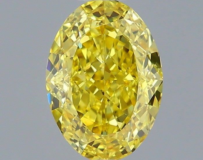 Loose Diamond - OVAL 1.08ct Fancy Vivid Yellow VVS1: Loose Diamond - OVAL 1.08ct Fancy Vivid Yellow VVS1 Source: This is a real non-mined Diamond that has been grown in a lab Shape: OVAL Carats: 1.08 Color: Fancy Vivid Yellow Certification: IGI Video: