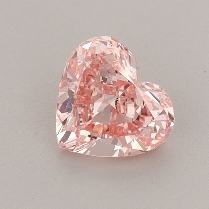 Loose Diamond - HEART 0.69ct Fancy Vivid Pink VS1: Loose Diamond - HEART 0.69ct Fancy Vivid Pink VS1 Source: This is a real non-mined Diamond that has been grown in a lab Shape: HEART Carats: 0.69 Color: Fancy Vivid Pink Certification: IGI Video: