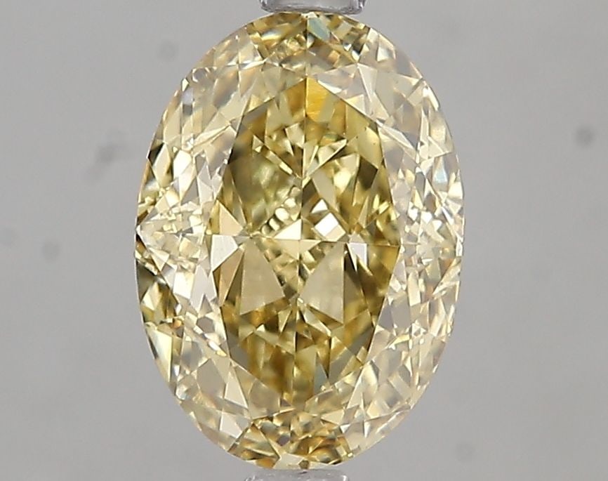 Loose Diamond - OVAL 2.08ct Fancy Intense Yellow VS1: Loose Diamond - OVAL 2.08ct Fancy Intense Yellow VS1 Source: This is a real non-mined Diamond that has been grown in a lab Shape: OVAL Carats: 2.08 Color: Fancy Intense Yellow Certification: IGI Video