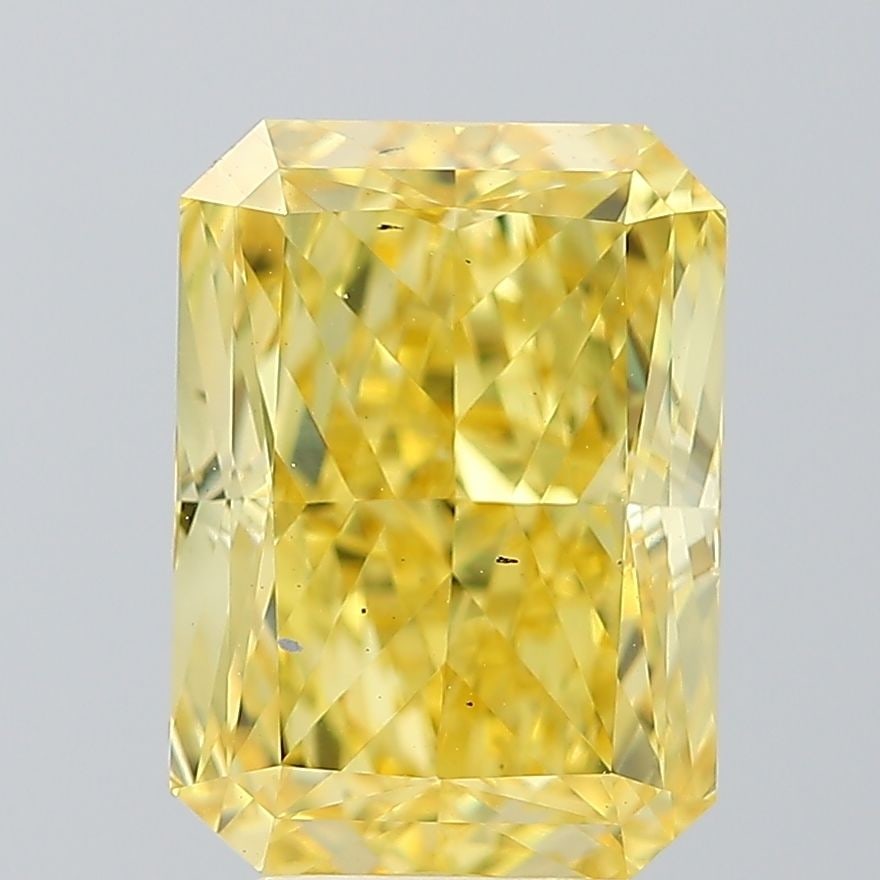 Loose Diamond - RADIANT 5.22ct Fancy Vivid Yellow VS2: Loose Diamond - RADIANT 5.22ct Fancy Vivid Yellow VS2 Source: This is a real non-mined Diamond that has been grown in a lab Shape: RADIANT Carats: 5.22 Color: Fancy Vivid Yellow Certification: IGI The