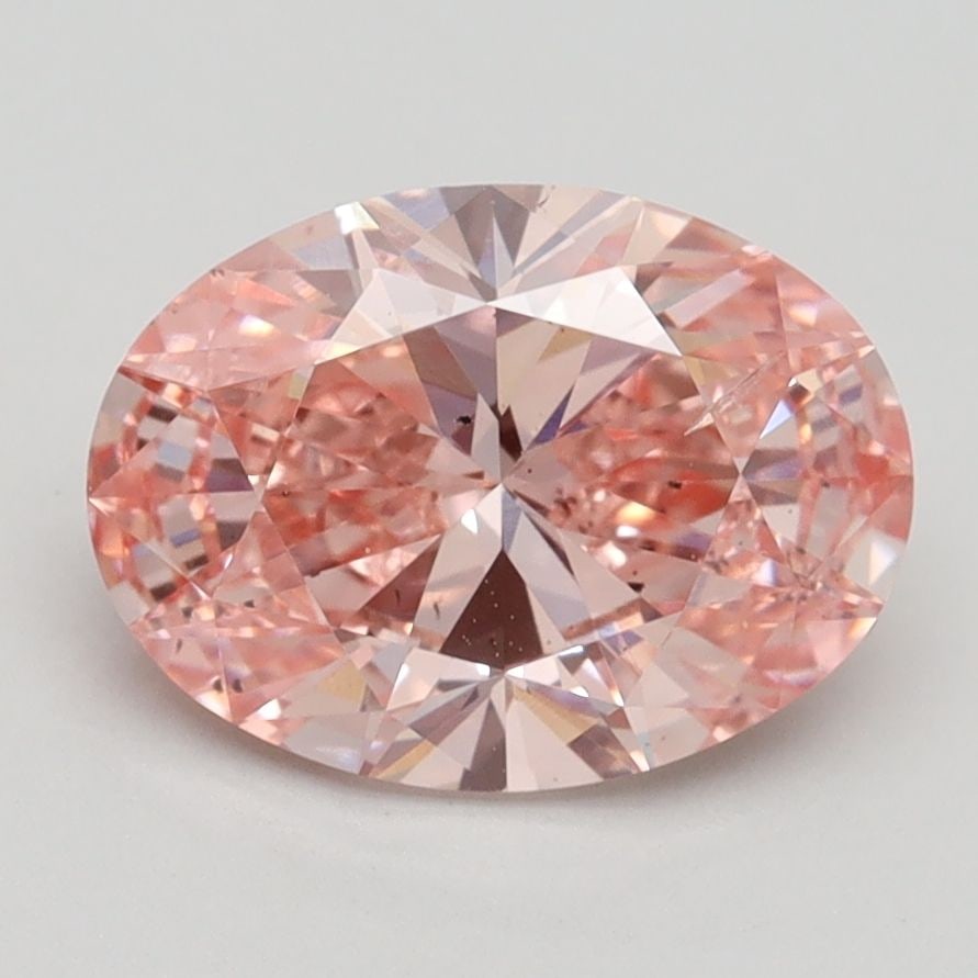 Loose Diamond - OVAL 2.2ct Fancy Vivid Pink SI1: Loose Diamond - OVAL 2.2ct Fancy Vivid Pink SI1 Source: This is a real non-mined Diamond that has been grown in a lab Shape: OVAL Carats: 2.2 Color: Fancy Vivid Pink Certification: IGI Video: