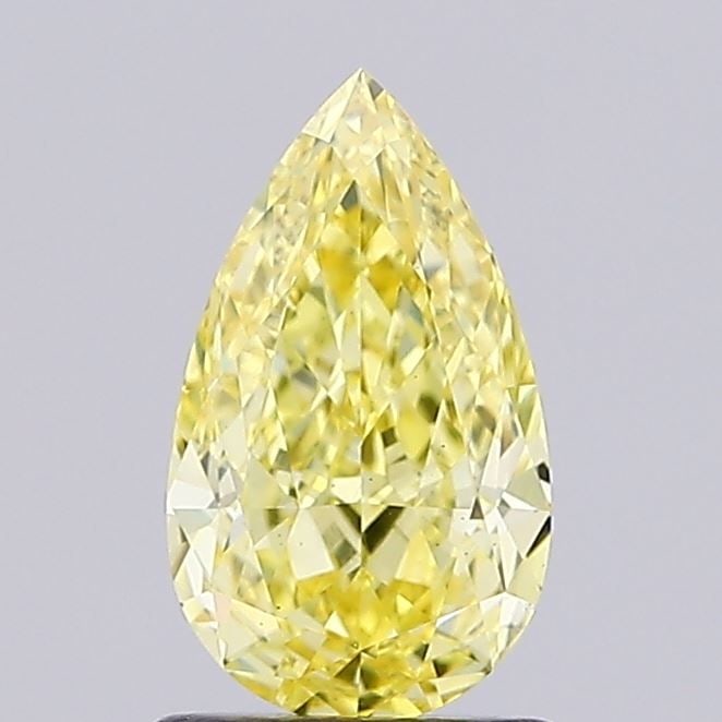 Loose Diamond - PEAR 1.38ct Fancy Vivid Yellow VS1: Loose Diamond - PEAR 1.38ct Fancy Vivid Yellow VS1 Source: This is a real non-mined Diamond that has been grown in a lab Shape: PEAR Carats: 1.38 Color: Fancy Vivid Yellow Certification: IGI Video:
