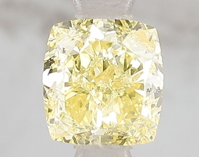 Loose Diamond - CUSHION MODIFIED 1.05ct Fancy Vivid Yellow SI1: Loose Diamond - CUSHION MODIFIED 1.05ct Fancy Vivid Yellow SI1 Source: This is a real non-mined Diamond that has been grown in a lab Shape: CUSHION MODIFIED Carats: 1.05 Color: Fancy Vivid Yellow Cert