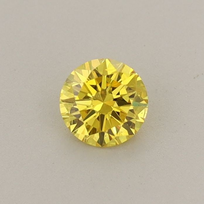 Loose Diamond - ROUND 0.29ct Fancy Vivid Yellow VS2: Loose Diamond - ROUND 0.29ct Fancy Vivid Yellow VS2 Source: This is a real non-mined Diamond that has been grown in a lab Shape: ROUND Carats: 0.29 Color: Fancy Vivid Yellow Certification: IGI Video: