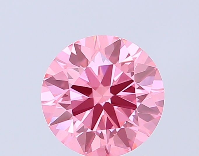 Ideal Loose Diamond - ROUND 0.87ct Fancy Vivid Pink VS1: Ideal Loose Diamond - ROUND 0.87ct Fancy Vivid Pink VS1 Source: This is a real non-mined Diamond that has been grown in a lab Shape: ROUND Carats: 0.87 Color: Fancy Vivid Pink Certification: IGI Video