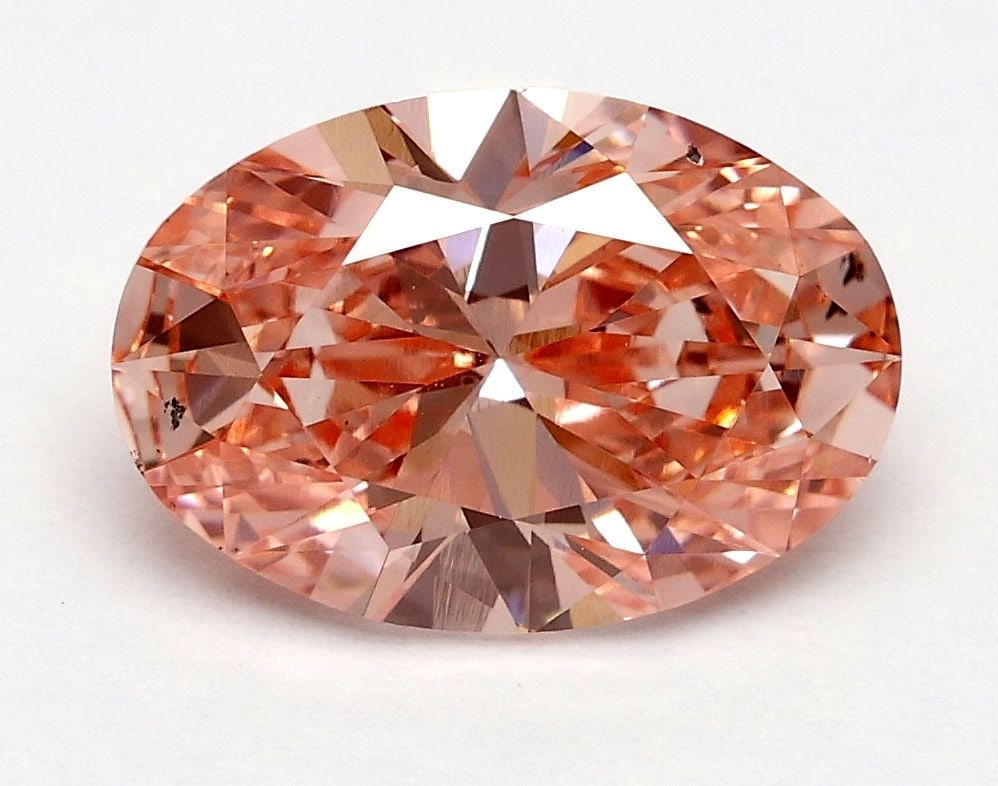 Loose Diamond - OVAL 1.7ct Fancy Vivid Pink SI1: Loose Diamond - OVAL 1.7ct Fancy Vivid Pink SI1 Source: This is a real non-mined Diamond that has been grown in a lab Shape: OVAL Carats: 1.7 Color: Fancy Vivid Pink Certification: IGI Video: